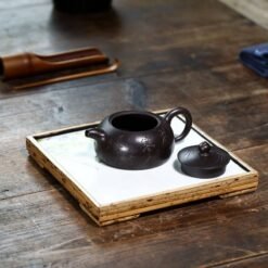 Giải đáp thắc mắc: Sự khác biệt giữa ấm chén tử sa và ấm chén gốm